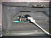 Glovebox with Haltech fuse block and serial cable.